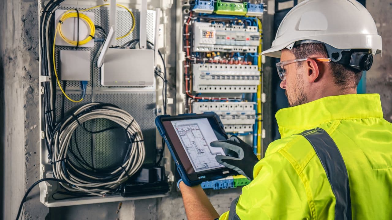 Electrical engineer at work on site